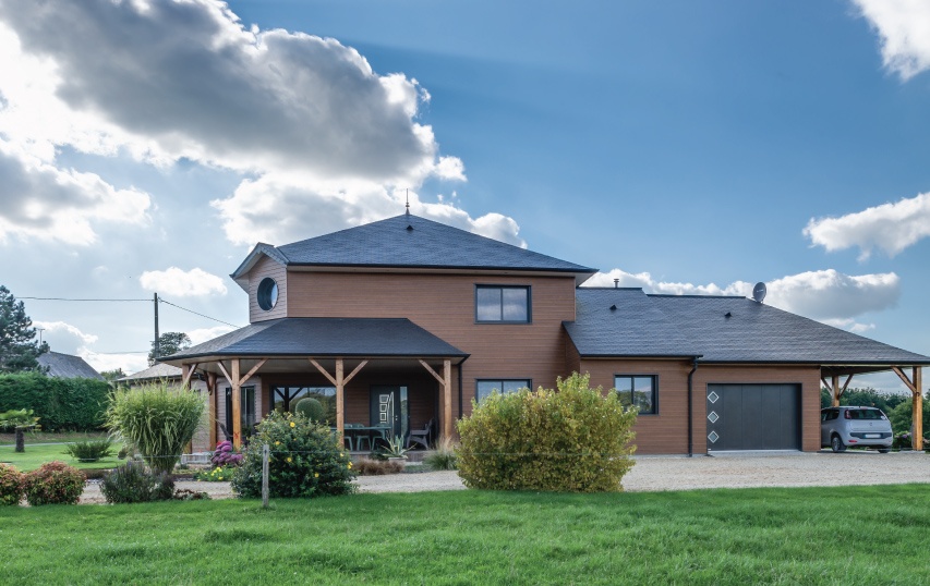 a french house with a slate roof