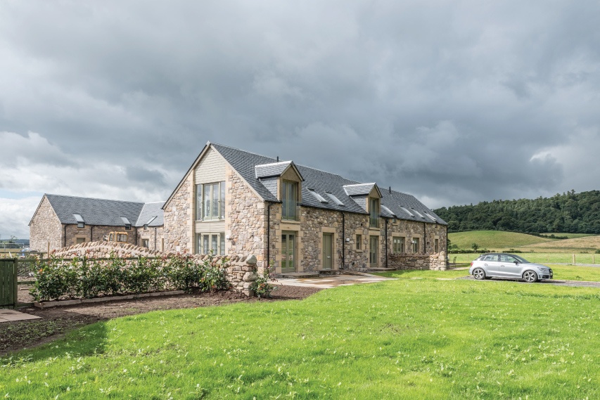 house with heavy3 roofing slate