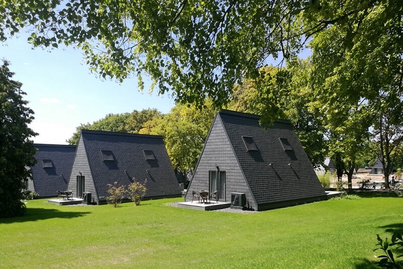triangular houses in the Zen Garden Resort in Zánka