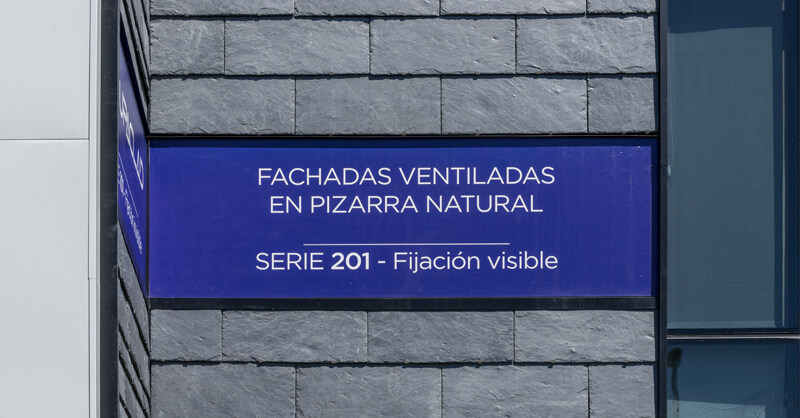 fachada ventilada de pizarra natural con estructura metálica 